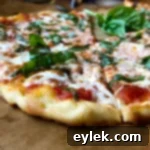 Your New Favorite Gluten-Free Pizza Crust 17 A slice of perfect gluten-free pizza Margherita, showcasing the crispy crust and fresh toppings.