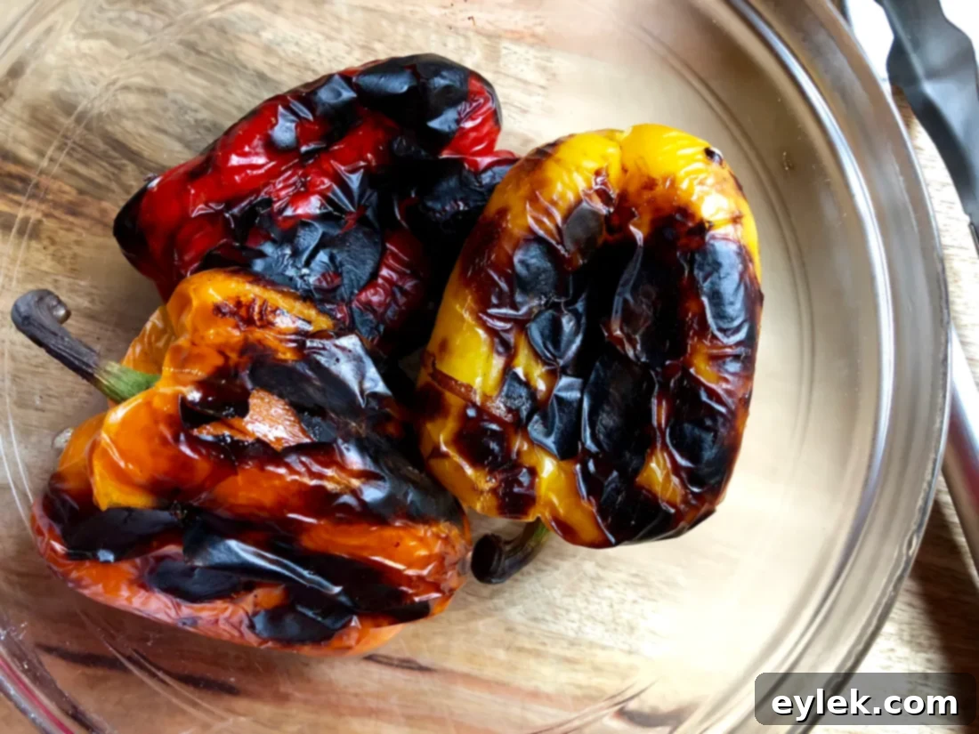 Another view of charred bell peppers, ready for the next step