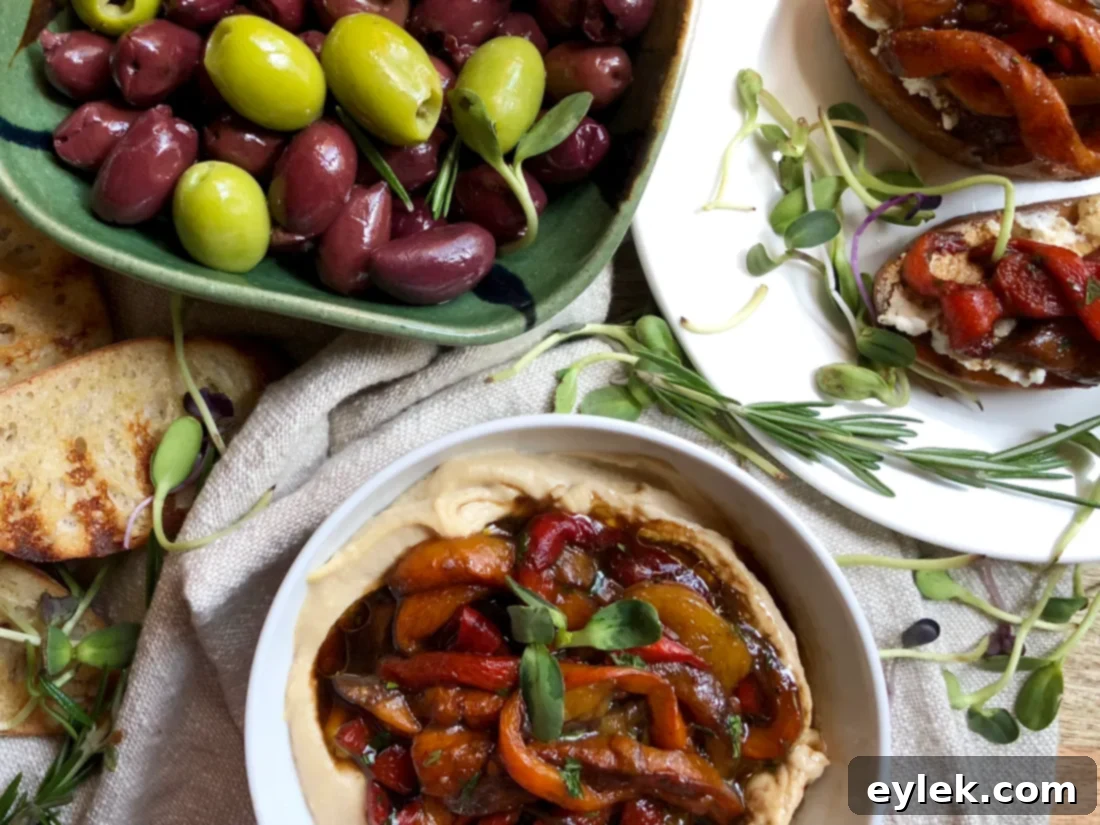 Close-up of marinated roasted bell pepper strips, highlighting the vibrant colors and herbs