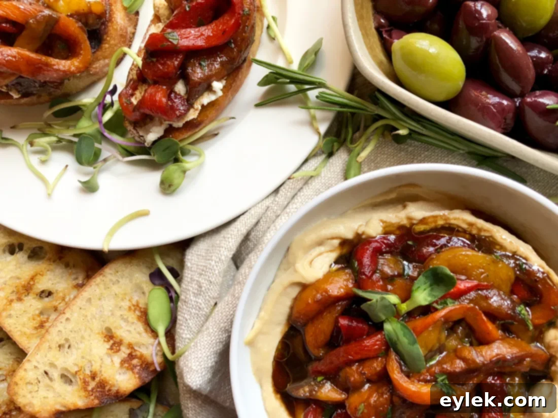 A beautifully plated dish of marinated roasted bell pepper strips garnished with fresh herbs