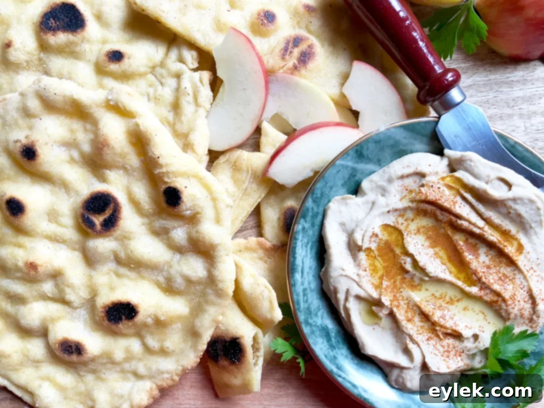 gluten-free naan-style bread served with hummus and olives