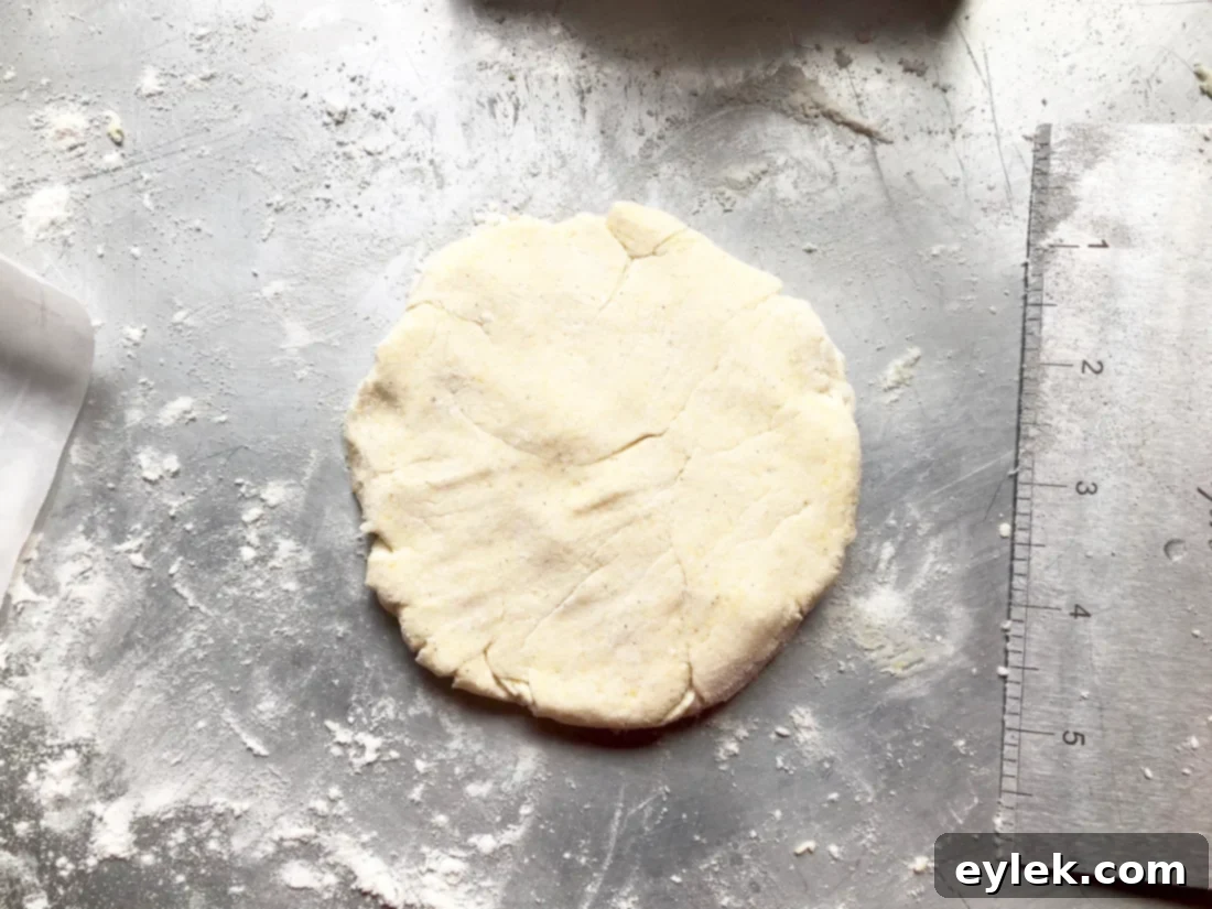 gluten-free naan-style bread dough being shaped