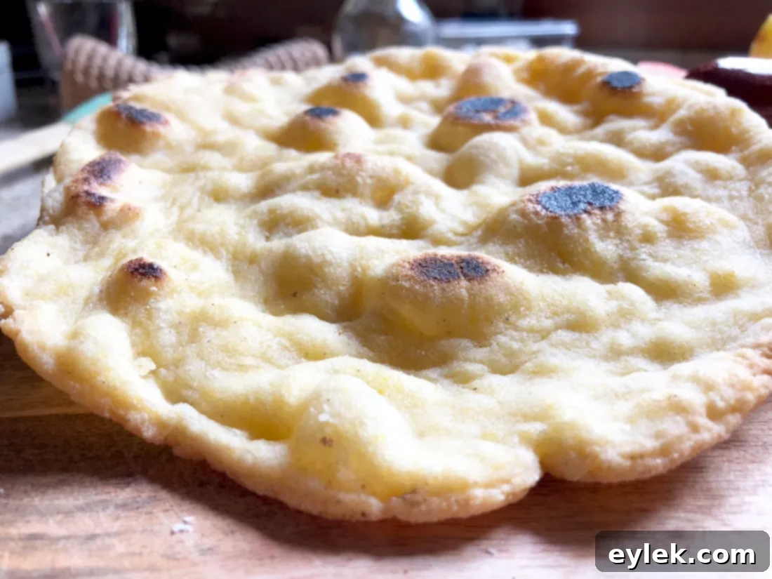 gluten-free naan-style bread on a cooling rack