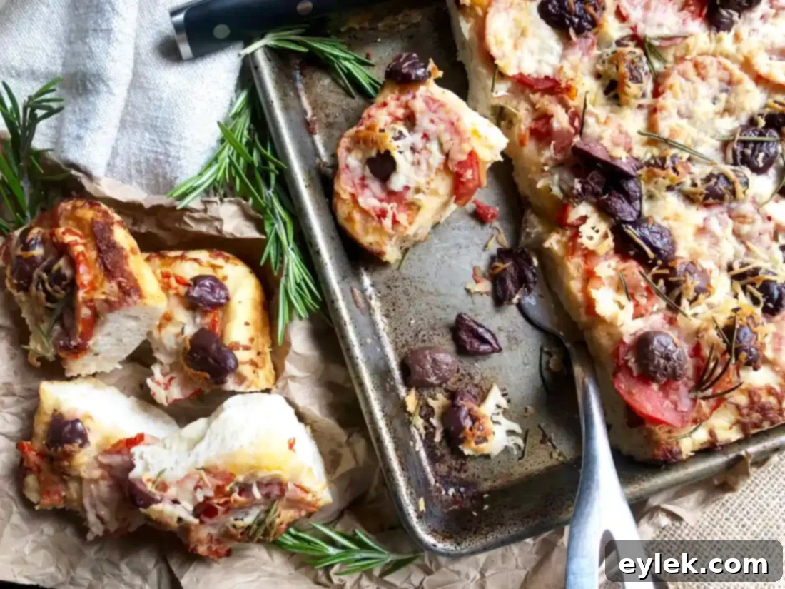 cheesy focaccia with tomatoes & olives