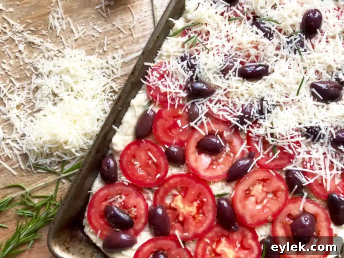 cheesy focaccia with tomatoes & olives