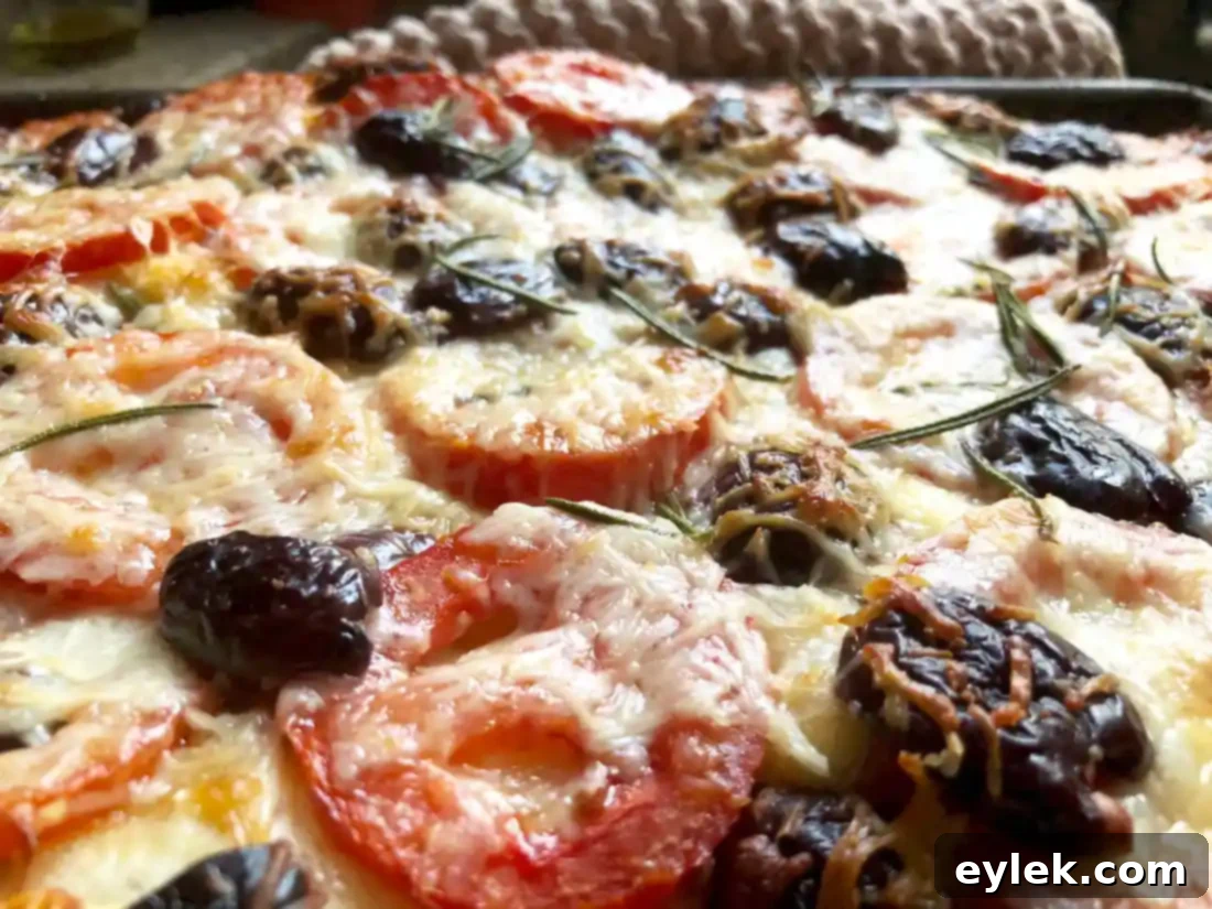 cheesy focaccia with tomatoes & olives