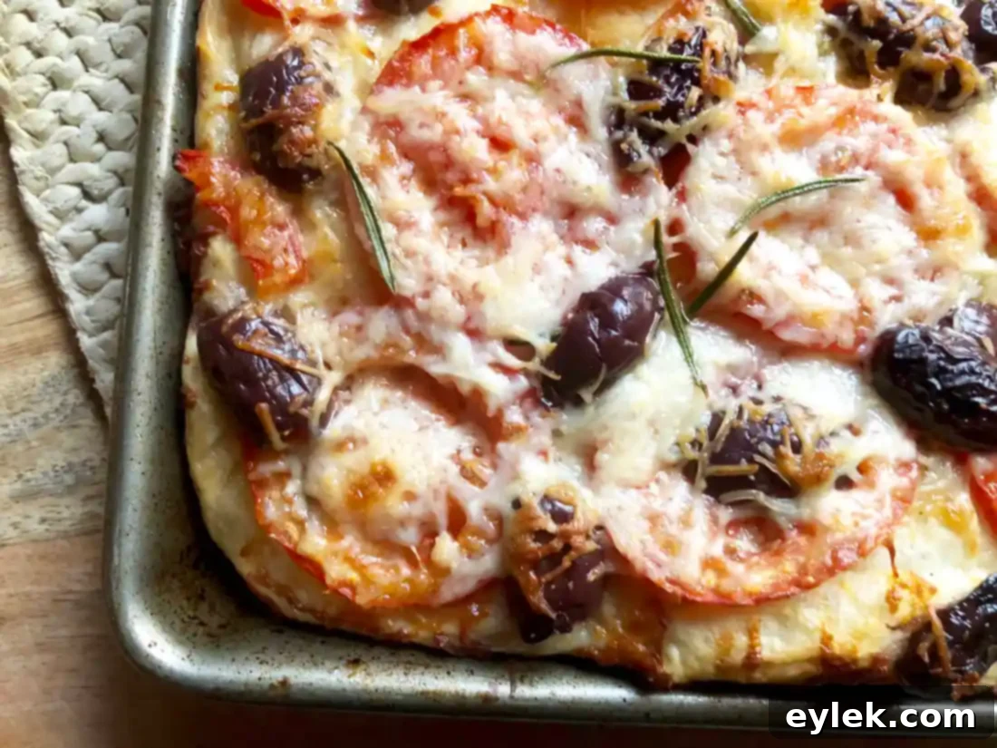 cheesy focaccia with tomatoes & olives