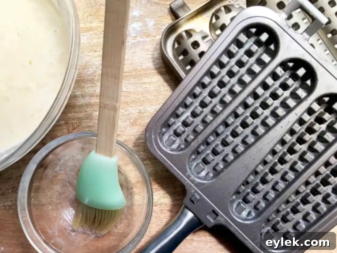 The Nordic Ware waffle stick pan open on a stovetop