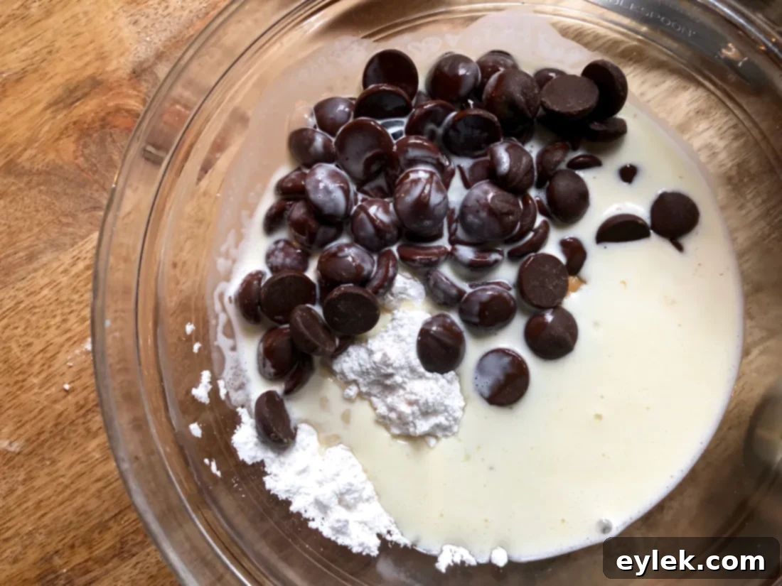 A close-up view of the perfectly smooth and glossy peanut butter chocolate filling.