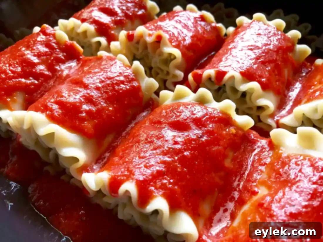 lasagna rolls with roasted red pepper sauce