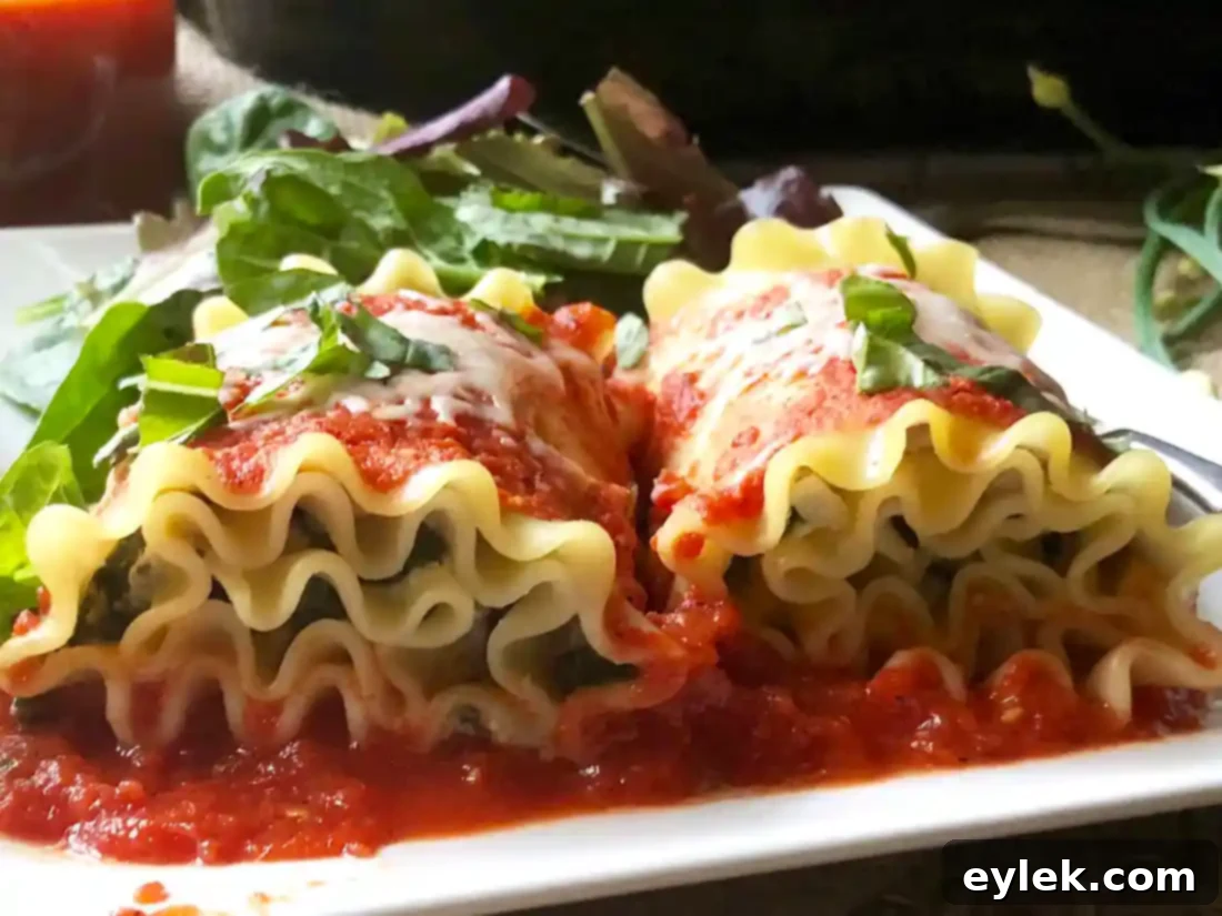 lasagna rolls with roasted red pepper sauce