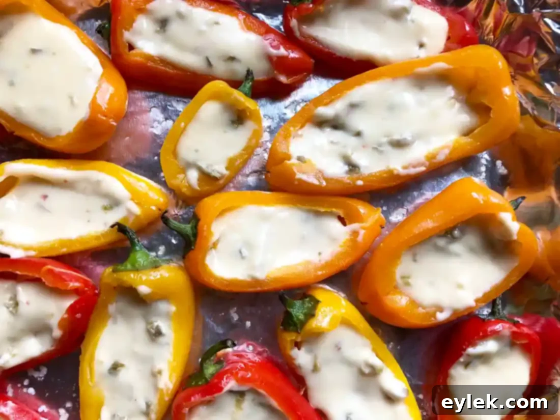 Queso-filled mini peppers baked to perfection