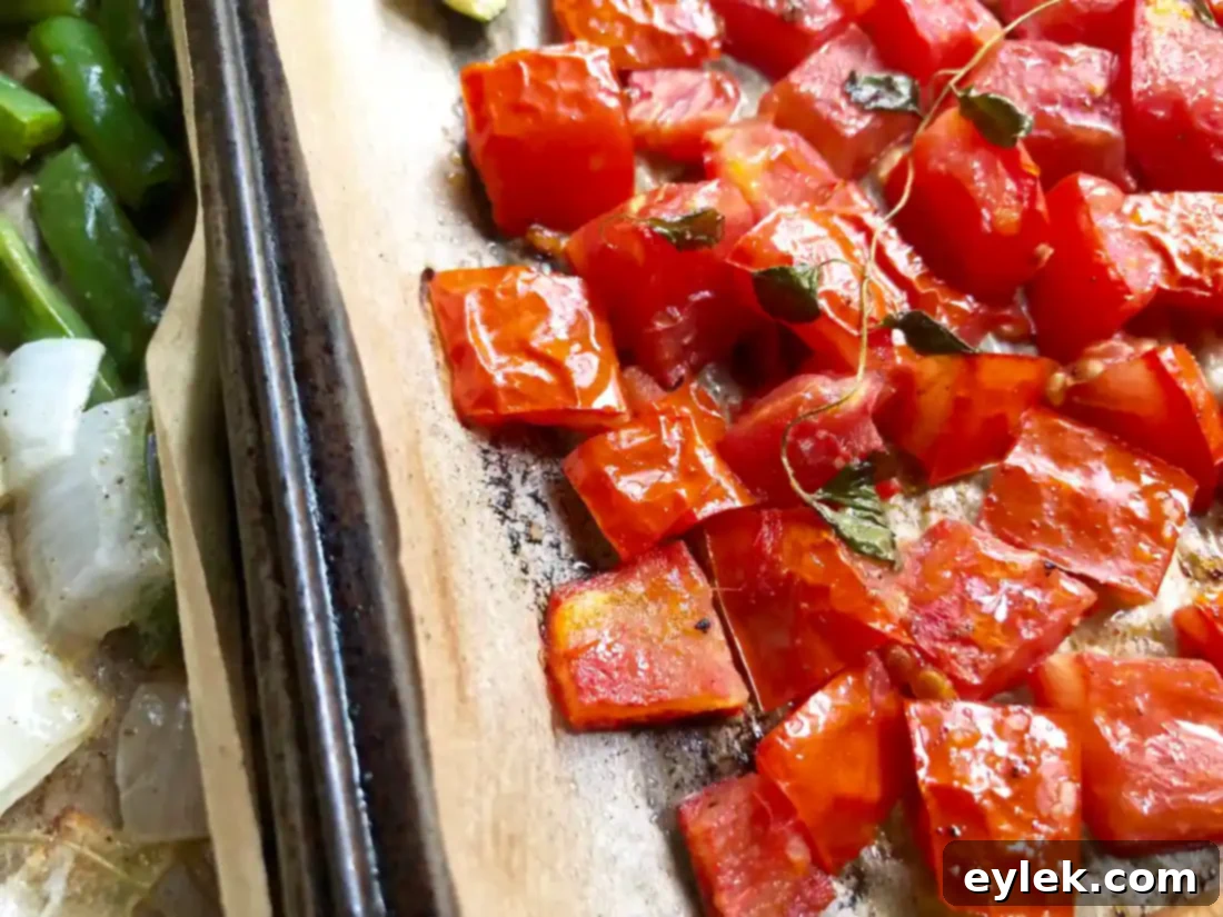 roasted peppers and broccoli florets on a baking sheet