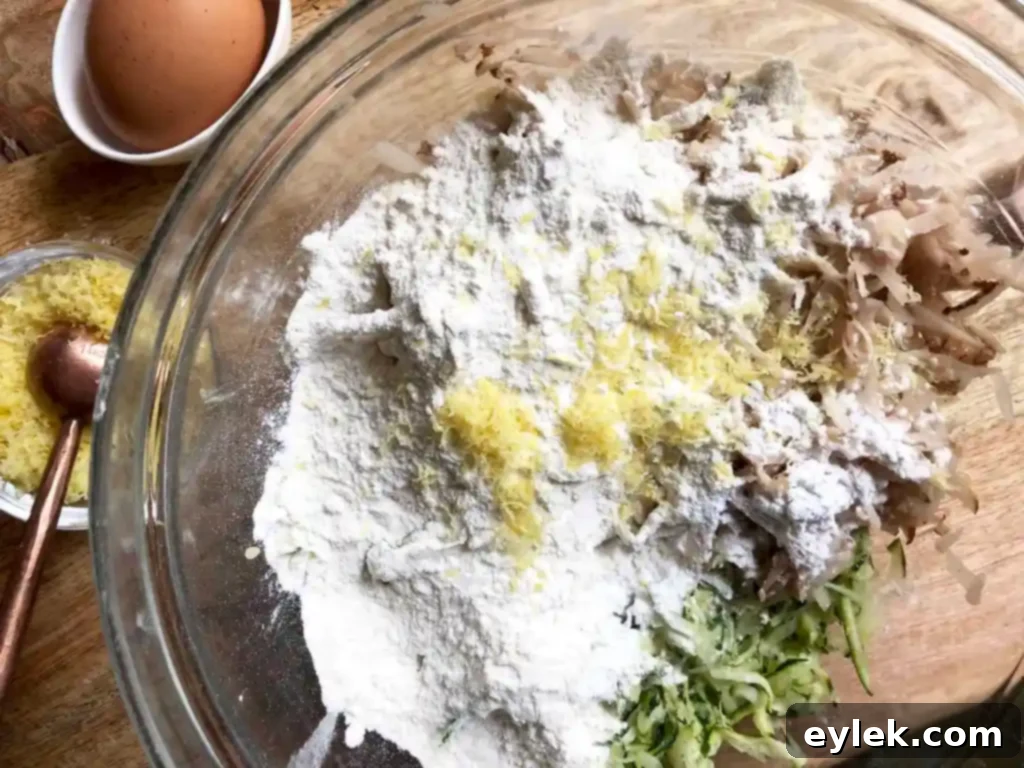 zucchini fritter batter mixed with egg