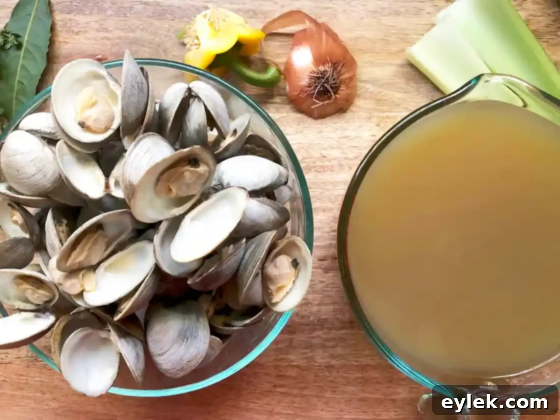 Elevated Manhattan Clam Chowder 7 straining clam broth through a fine-mesh sieve