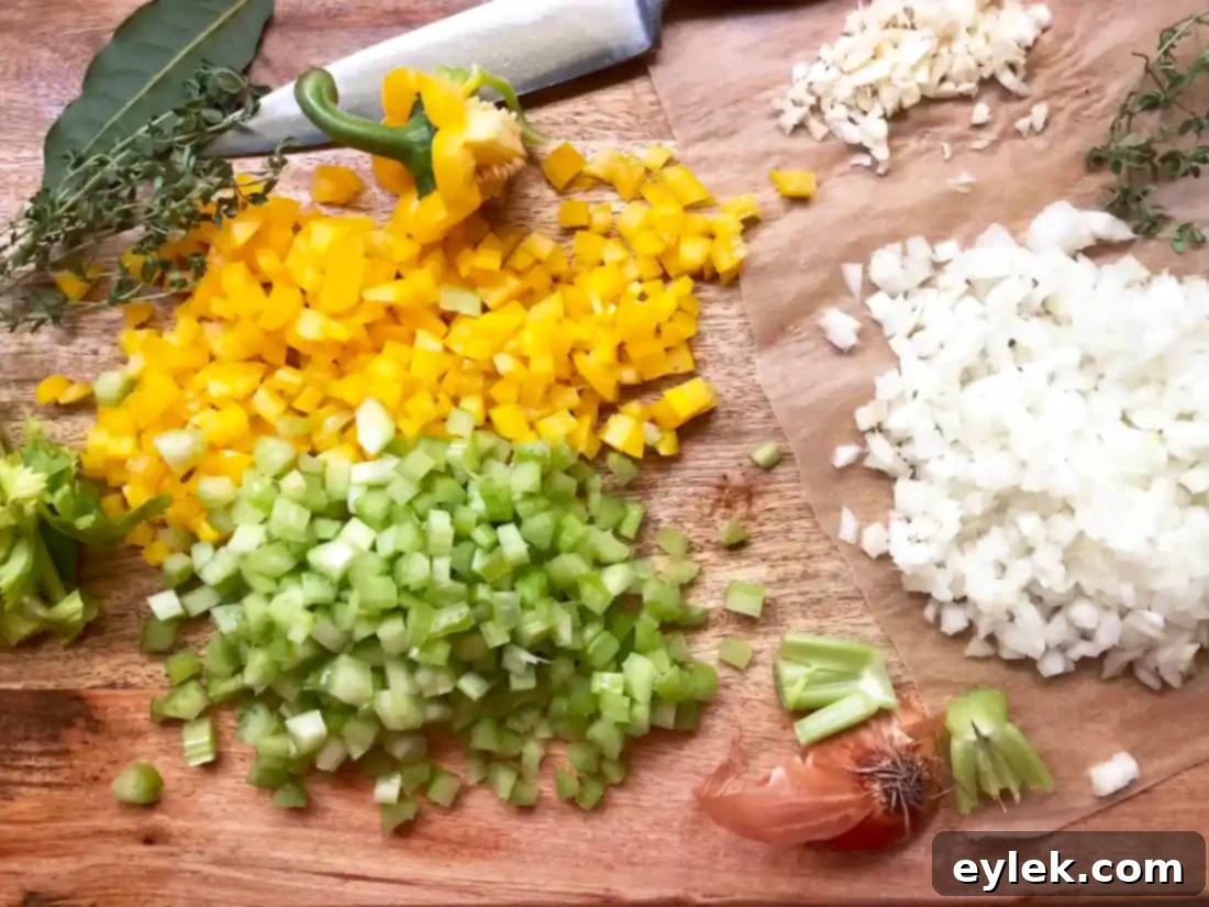 Elevated Manhattan Clam Chowder 8 cooking bacon and vegetables for clam chowder