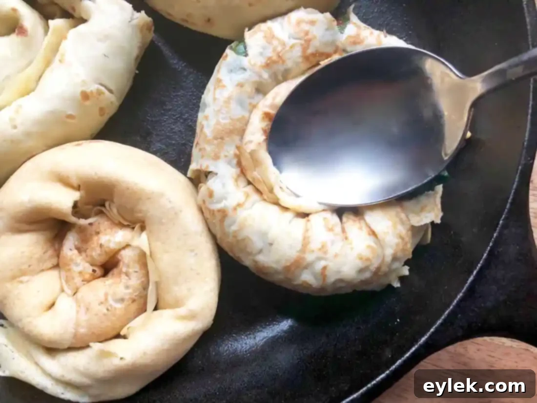 Savory Crepe Egg Rolls with Parmesan and egg divots