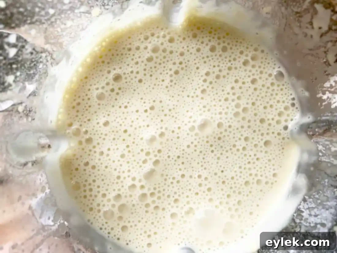 Savory Crepe Egg Rolls batter in a blender
