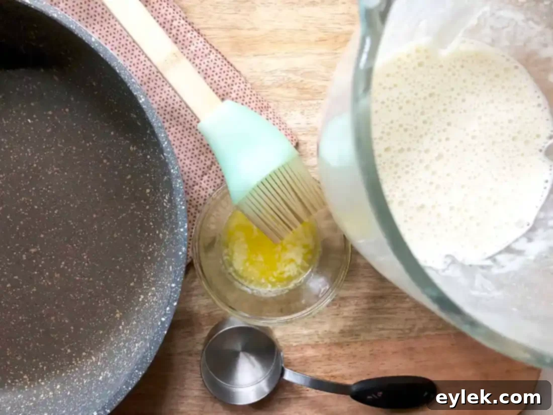 Cooking Savory Crepe Egg Rolls on a skillet