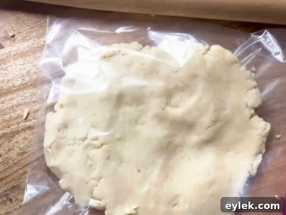 two batches of ham & cheese slab pie dough