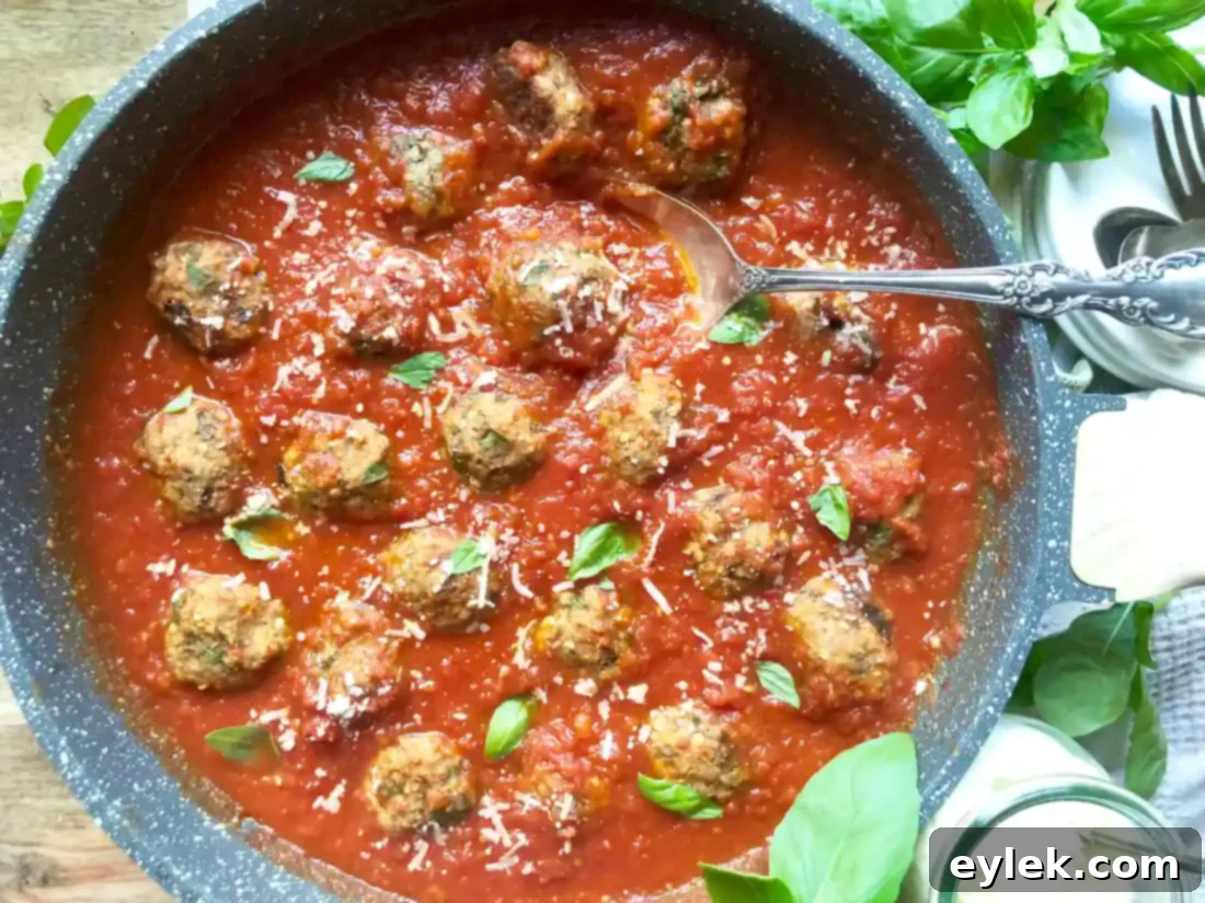 eggplant parmesan meatballs on a plate with pasta