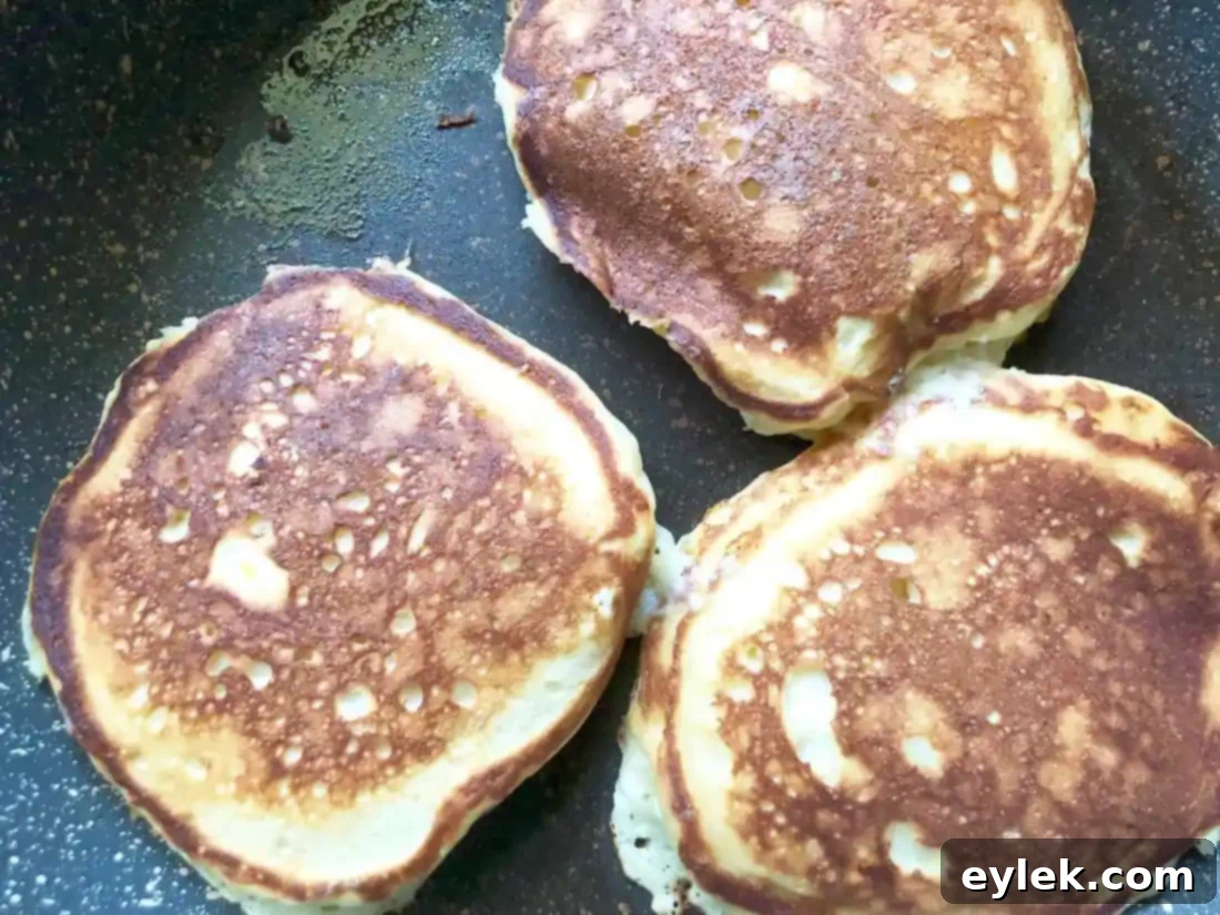 ricotta pancakes with brown butter-maple syrup & blueberry compote