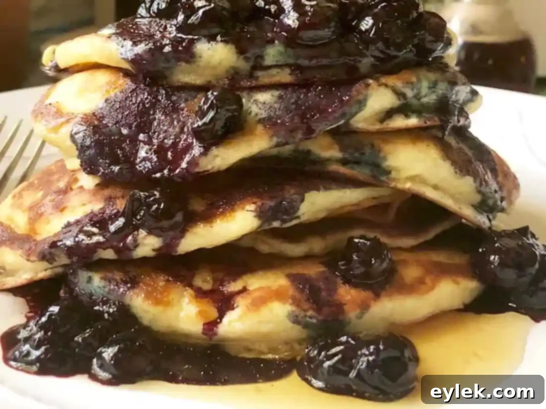 ricotta pancakes with brown butter-maple syrup & blueberry compote