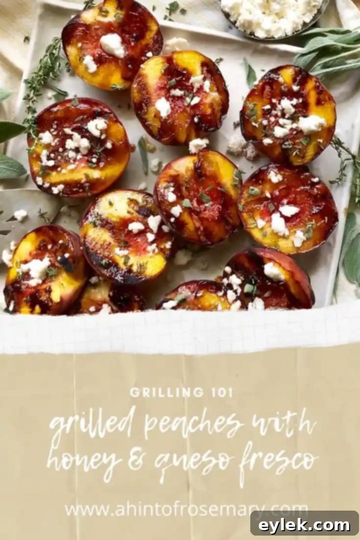 Close-up of a beautifully presented grilled peach with honey and queso fresco