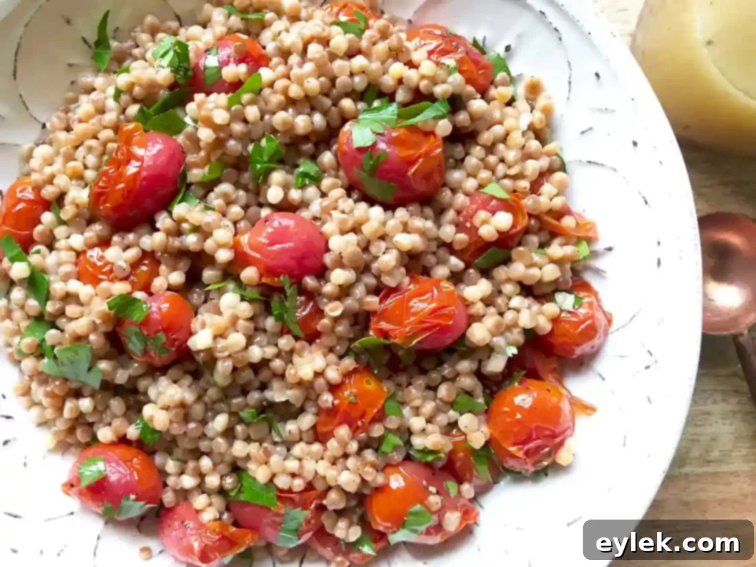 toasted couscous and roasted tomato salad with Parmesan