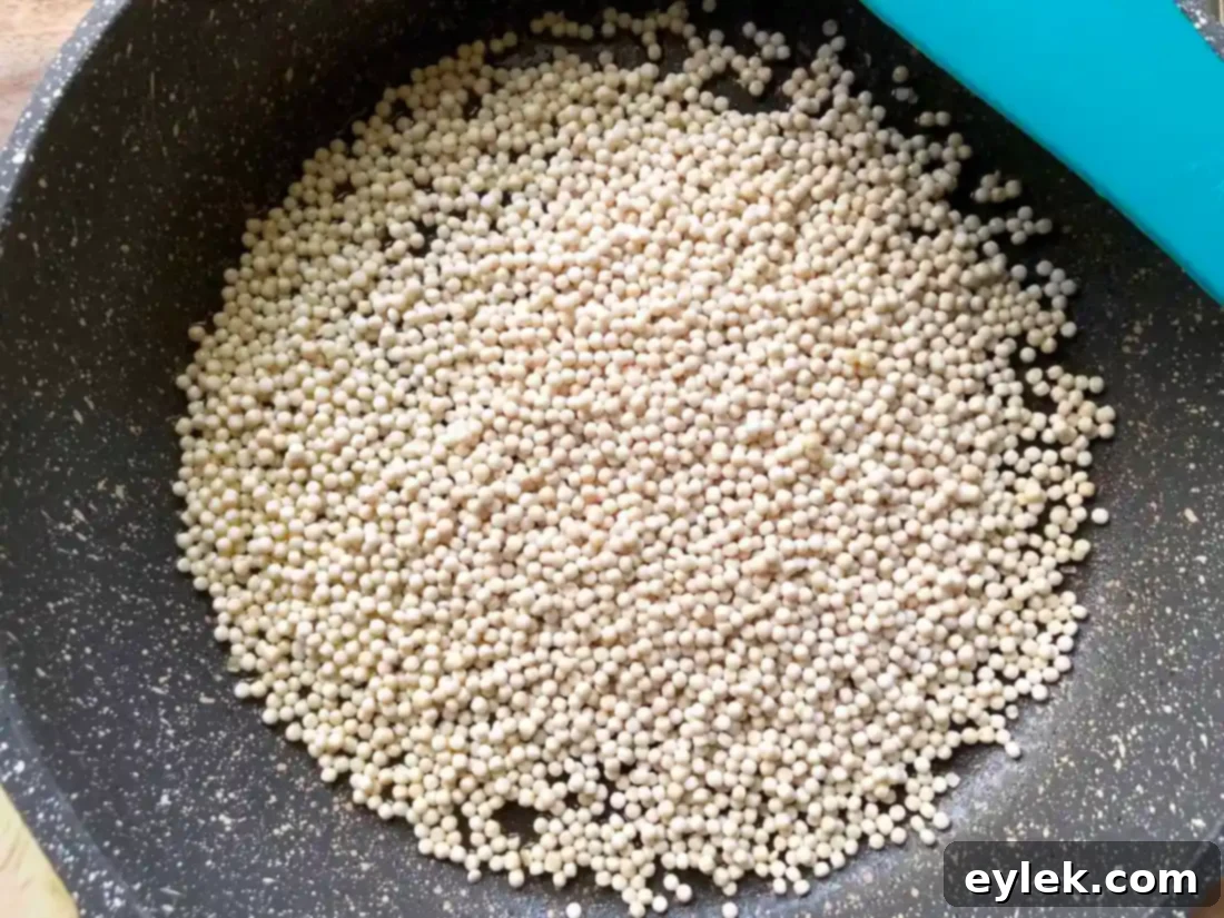 toasting couscous in a skillet