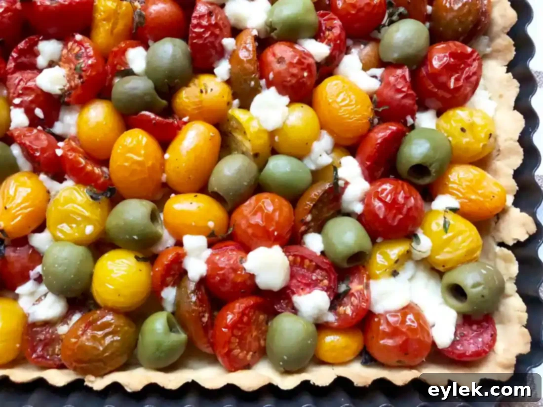 Slicing the Cheesy Tomato & Olive Tart