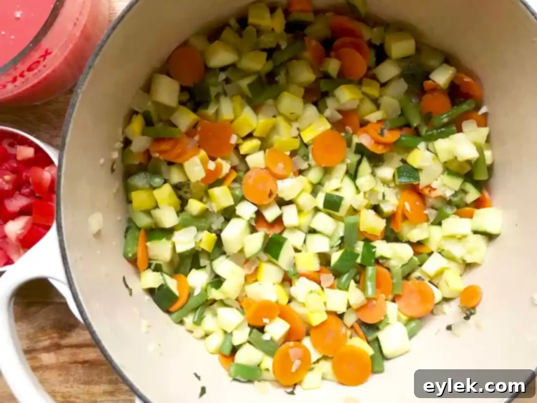 minestrone broth simmering with vegetables