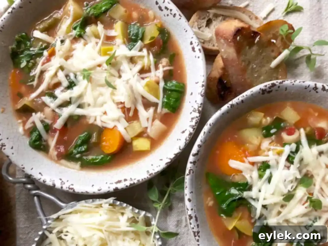 cheesy end-of-season garden minestrone garnished with black pepper