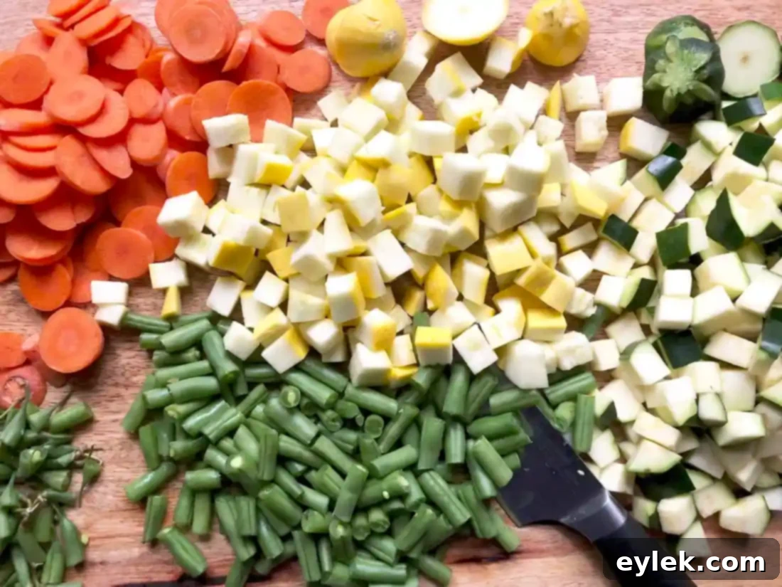 freshly chopped vegetables for cheesy garden minestrone