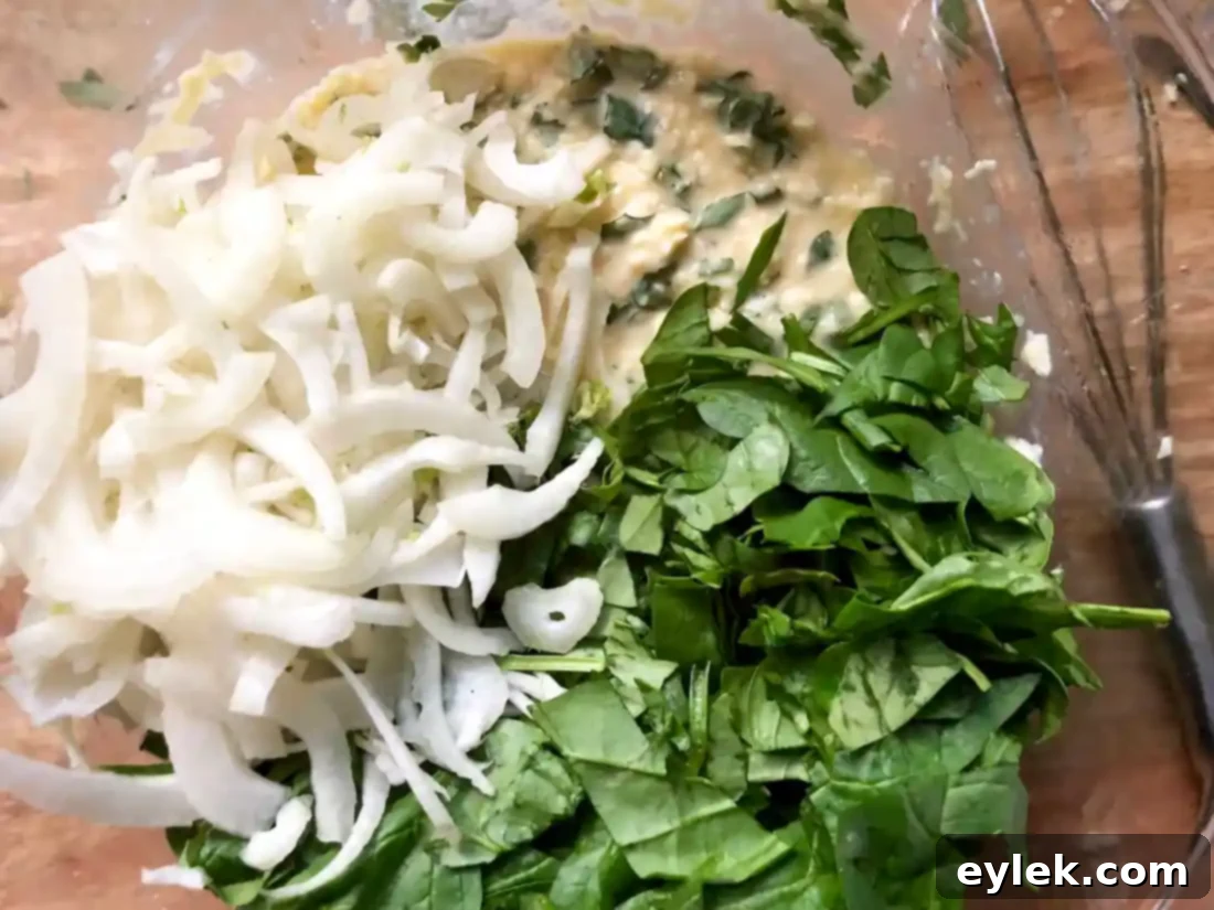 Close up of egg mixture with vegetables