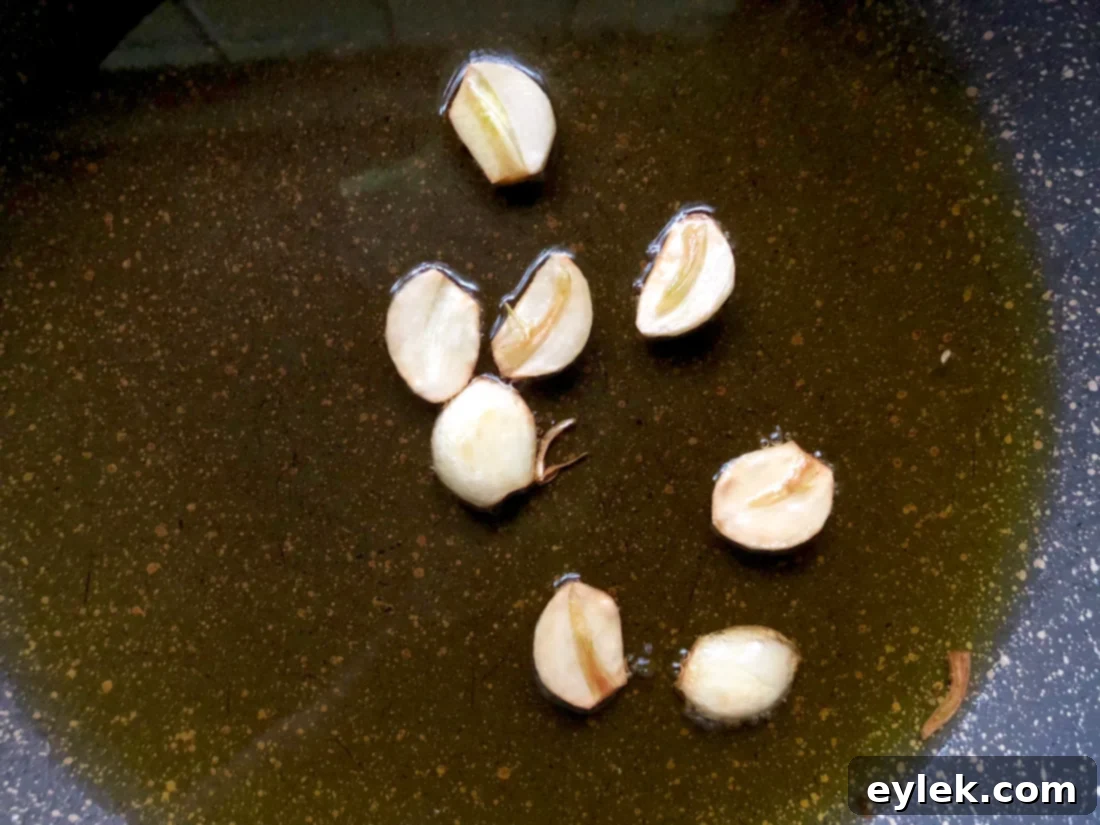 Cleaned and trimmed small mushrooms ready for cooking.