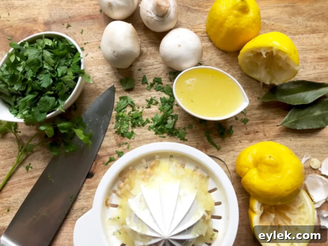 Assorted ingredients for the mushroom marinade, including liquids and spices, arranged on a kitchen counter.