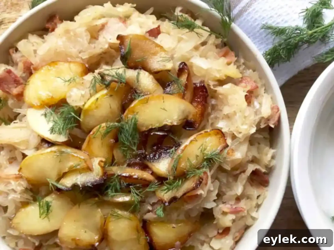 sauerkraut with bacon & sautéed apples in a serving bowl