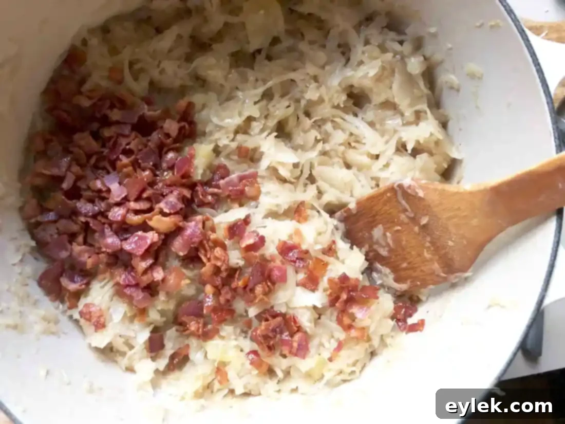 stirring bacon into sauerkraut