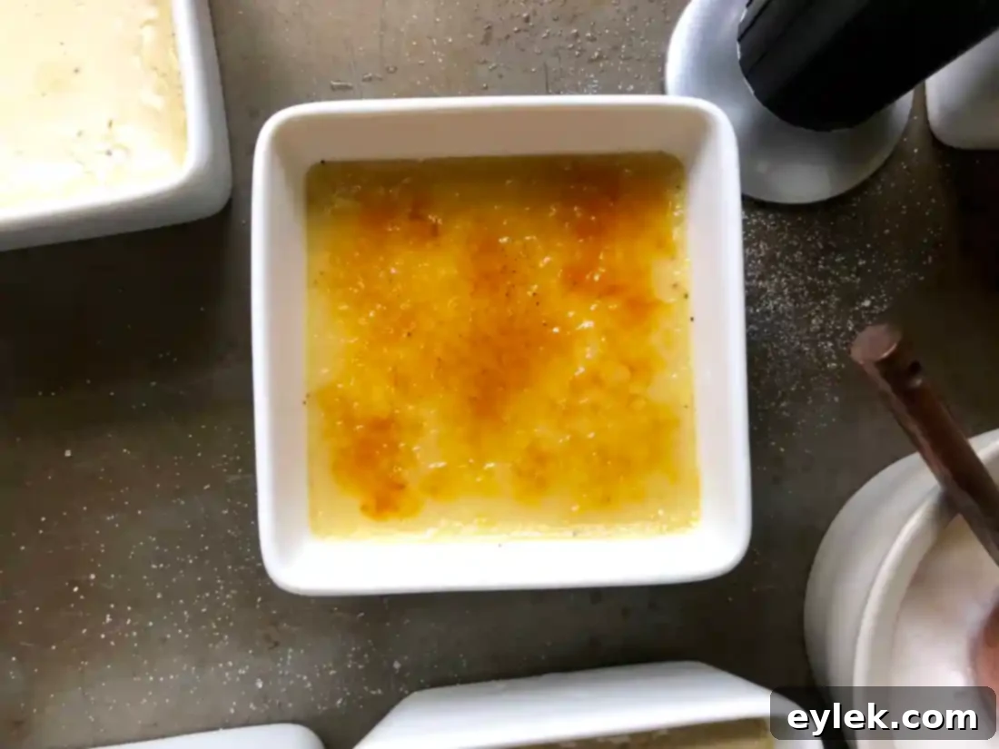 Close-up of pumpkin crème brûlée with broken sugar crust