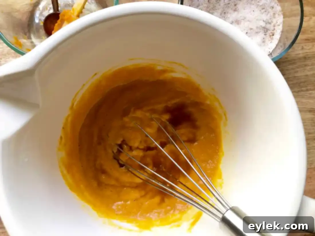 Mixing the pumpkin custard ingredients