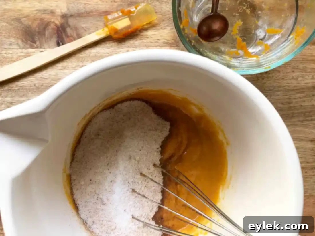 Straining the pumpkin custard mixture