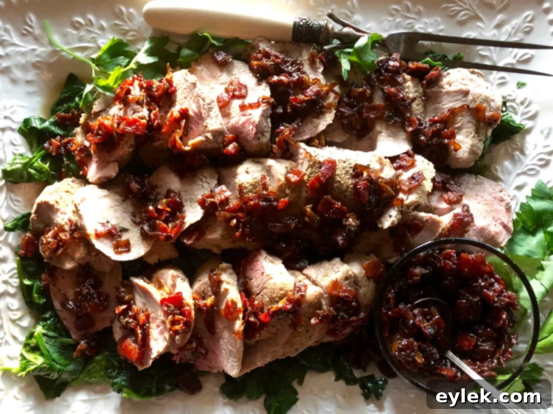 Sliced pork tenderloin with sautéed spinach and bacon-maple dressing