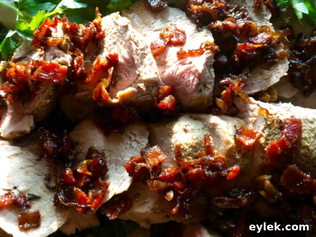 Close-up of a serving of pork tenderloin with dressing