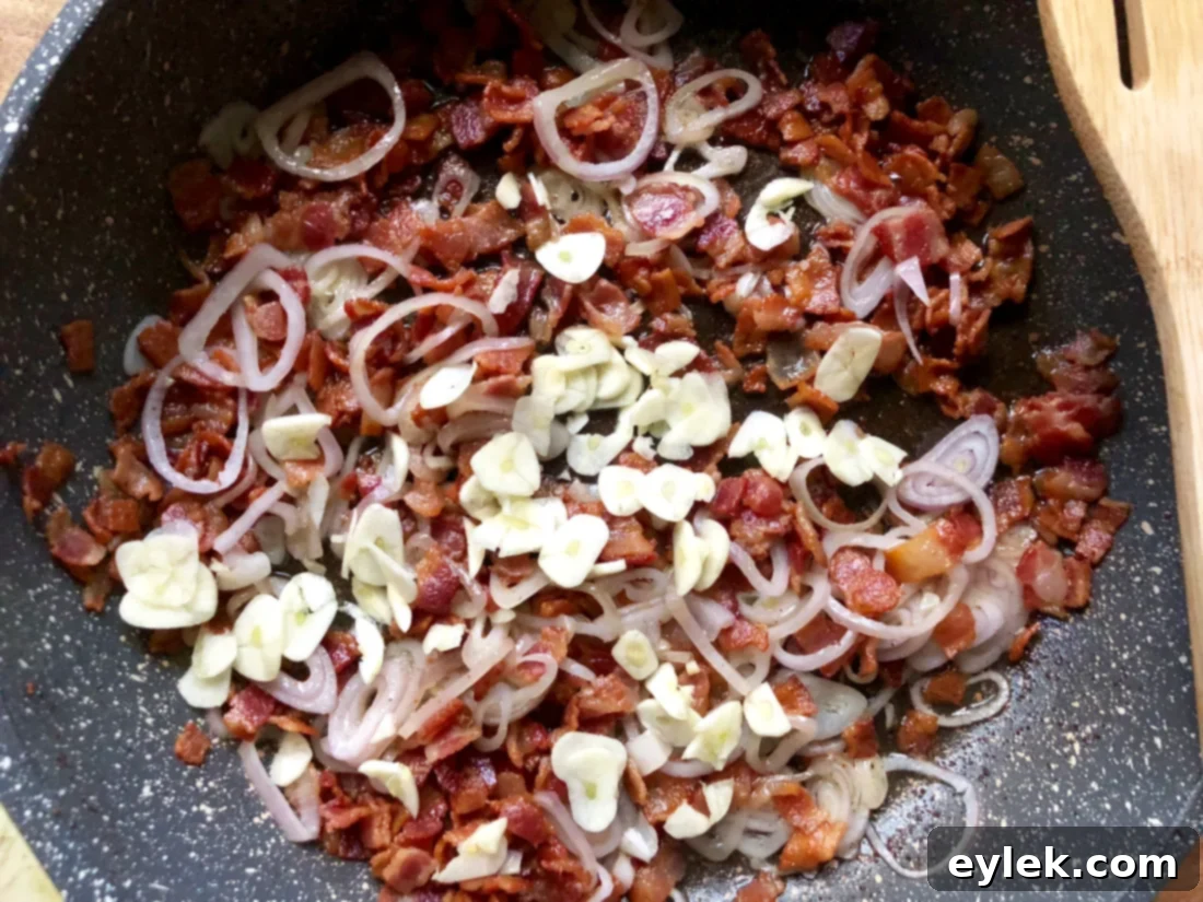 Adding sage to the bacon and shallot mixture