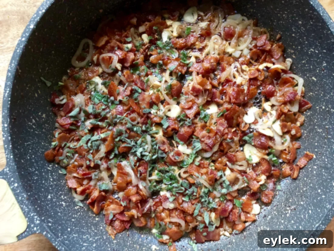 Balsamic vinegar and maple syrup being added to the dressing