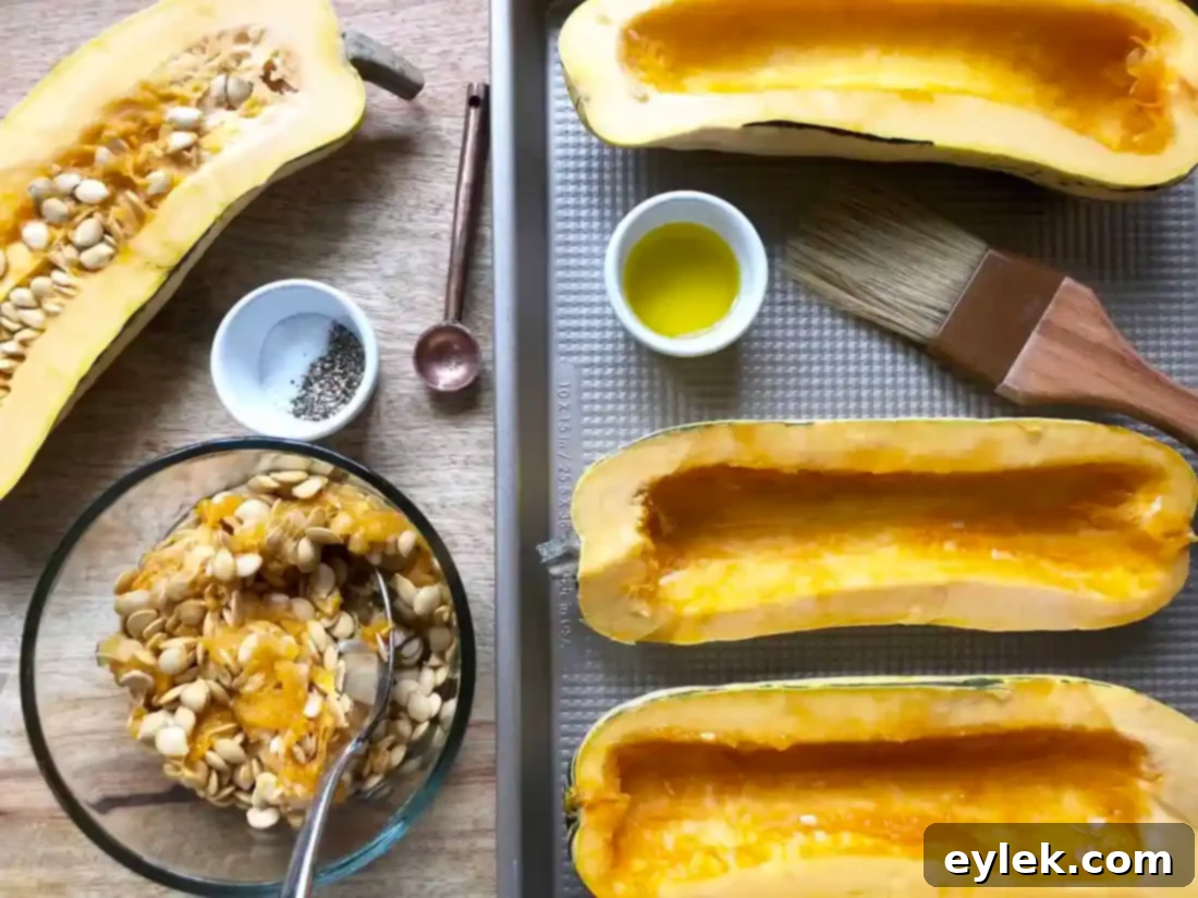 Savory Sausage Stuffed Delicata Squash 3 Sausage Stuffed Delicata Squash halves on a cutting board, ready for seeding.