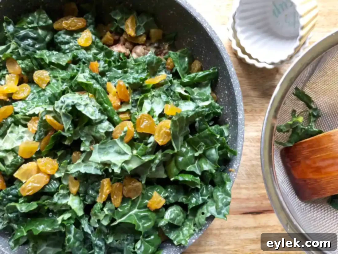 Savory Sausage Stuffed Delicata Squash 10 Stirring in Swiss cheese to the sausage and kale mixture.