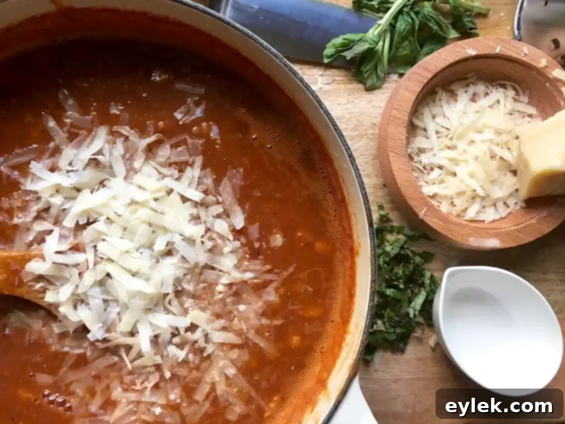 Parmesan cheese and red wine vinegar stirred into the finished Pasta e Fagioli