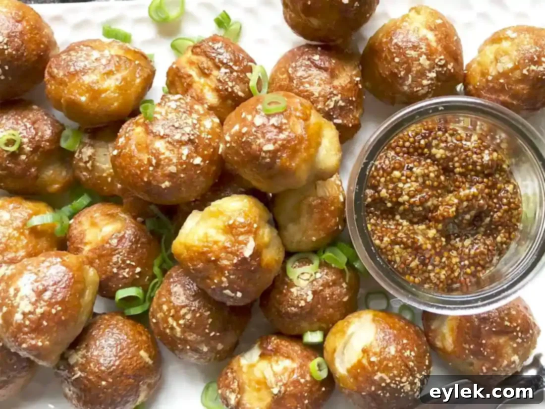 Easy Homemade Pretzel Bites in a serving bowl with a mustard dip